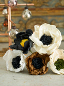 Dual-colored vintage-inspired crepe paper flowers. Handmade Christmas and seasonal ornaments in beige, black, brown, and white