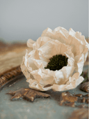 Dual-colored vintage-inspired crepe paper flowers. Handmade Christmas and seasonal ornaments in beige, black, brown, and white