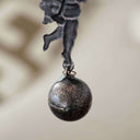 Vintage-Inspired Metal Faun Candleholder With Ball